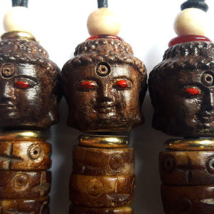 3 têtes de bouddha